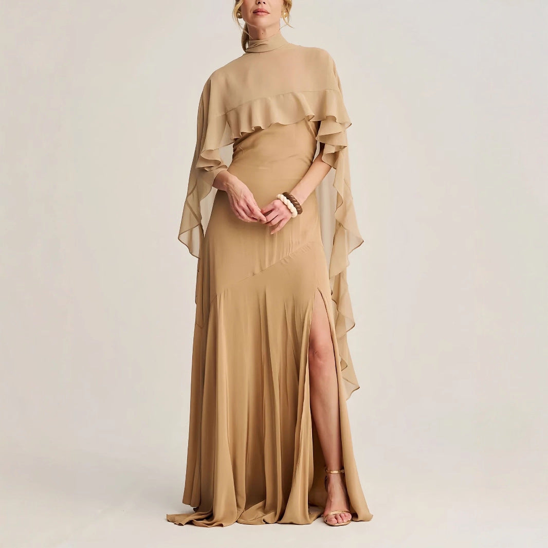 A long skirt with a turtleneck trimmed cape