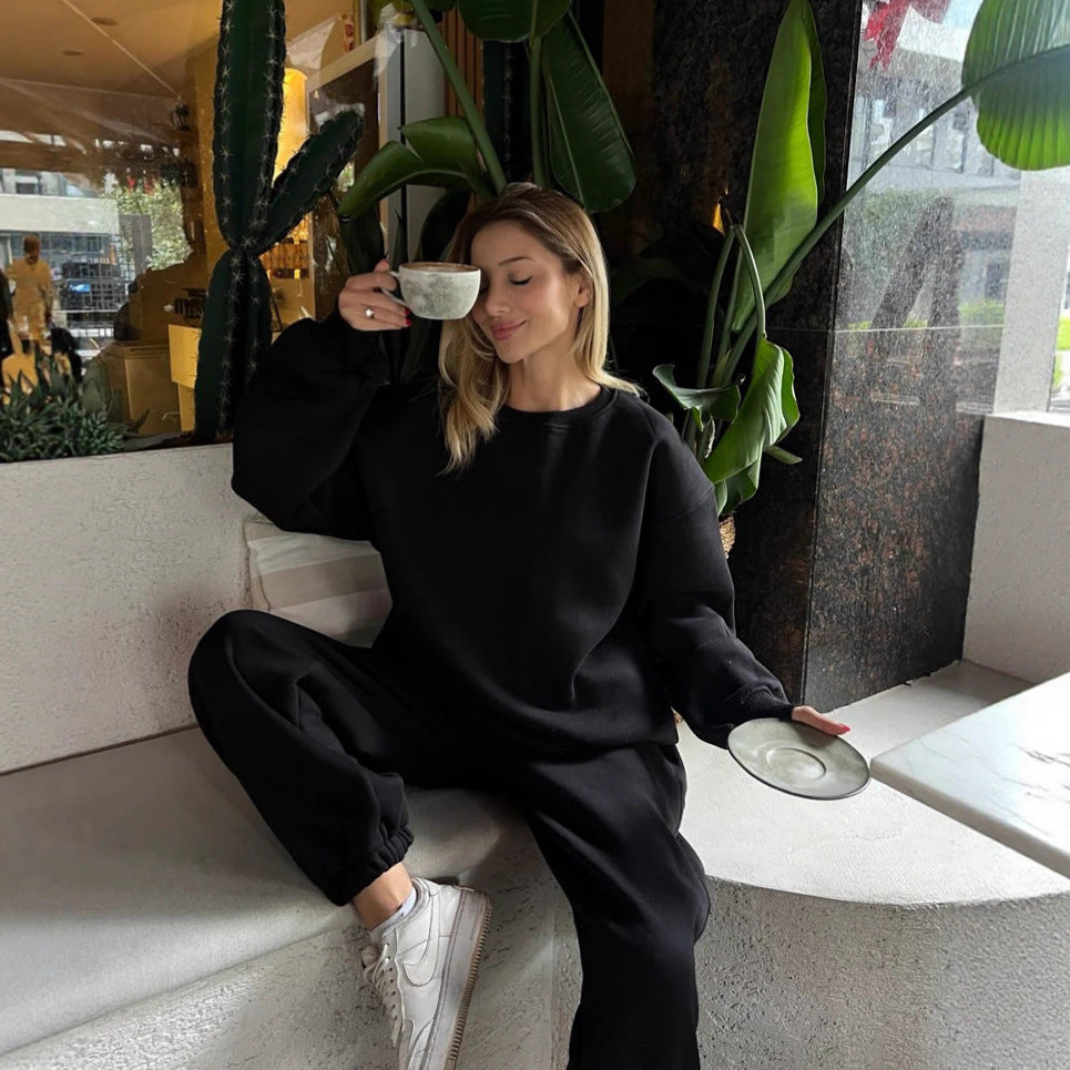 Solid color loose crew neck sweater strap-up trousers cover