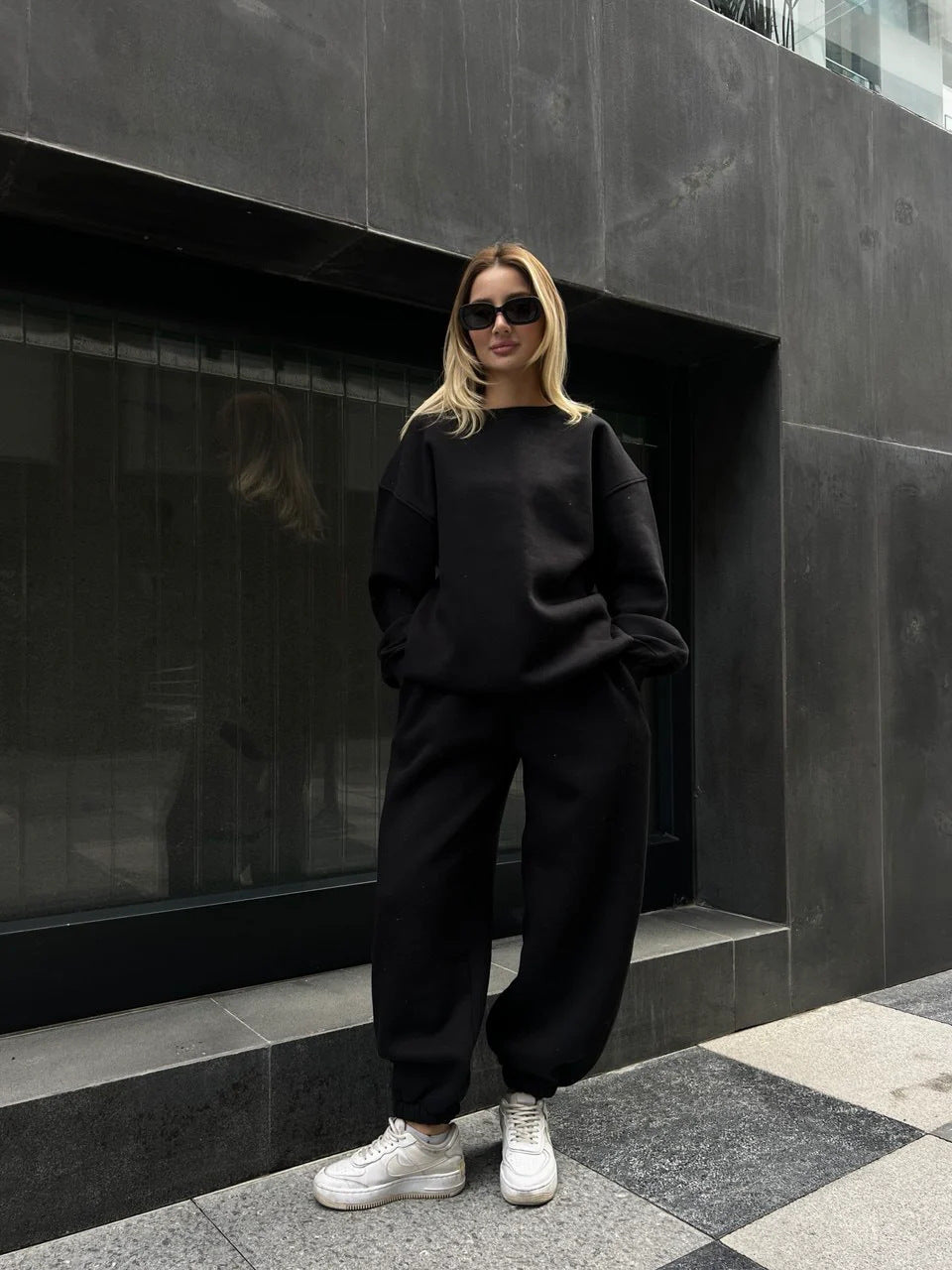 Solid color loose crew neck sweater strap-up trousers cover