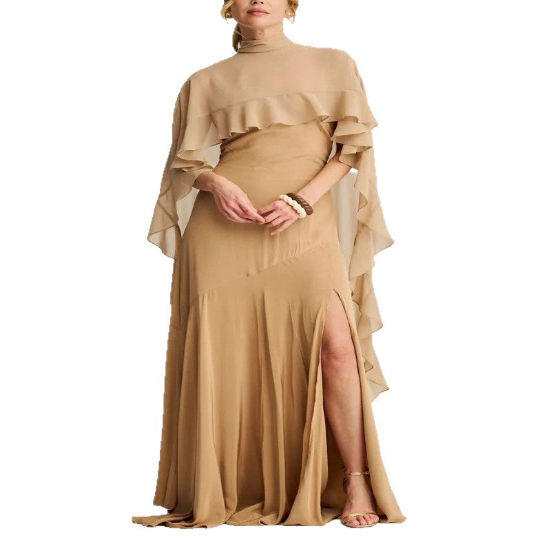 A long skirt with a turtleneck trimmed cape