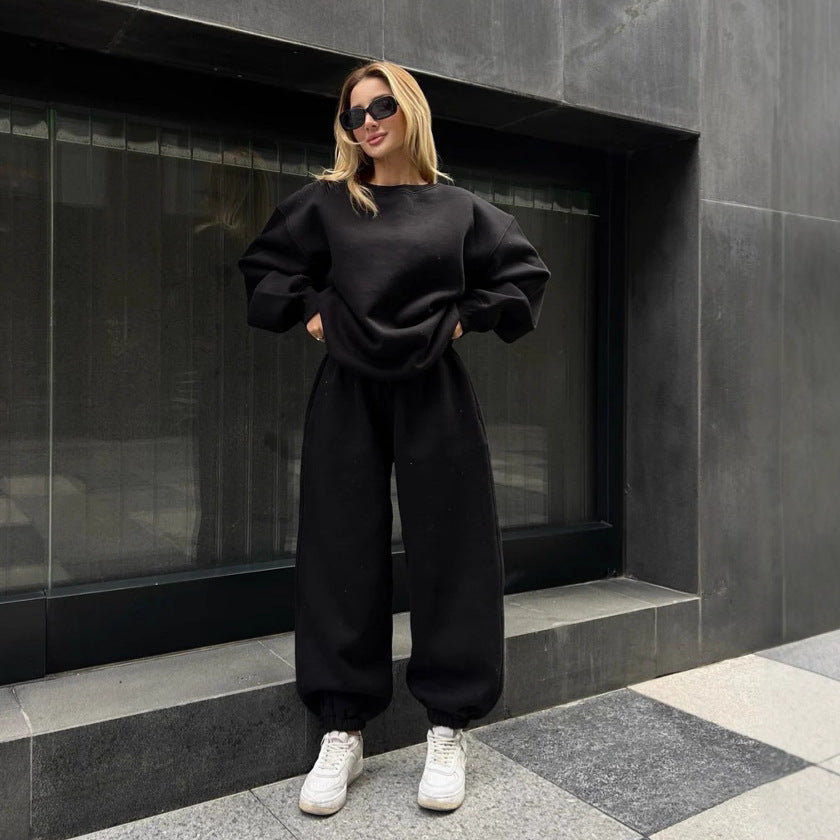 Solid color loose crew neck sweater strap-up trousers cover