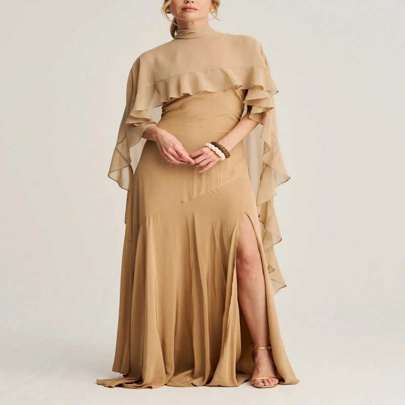 A long skirt with a turtleneck trimmed cape