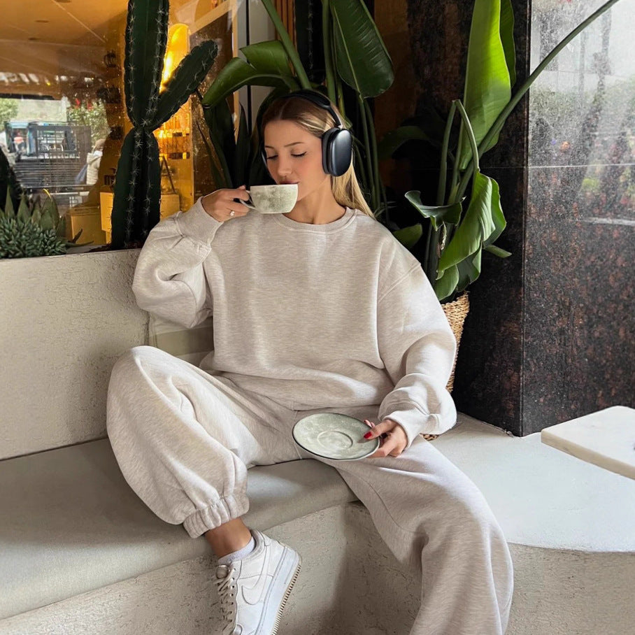 Solid color loose crew neck sweater strap-up trousers cover