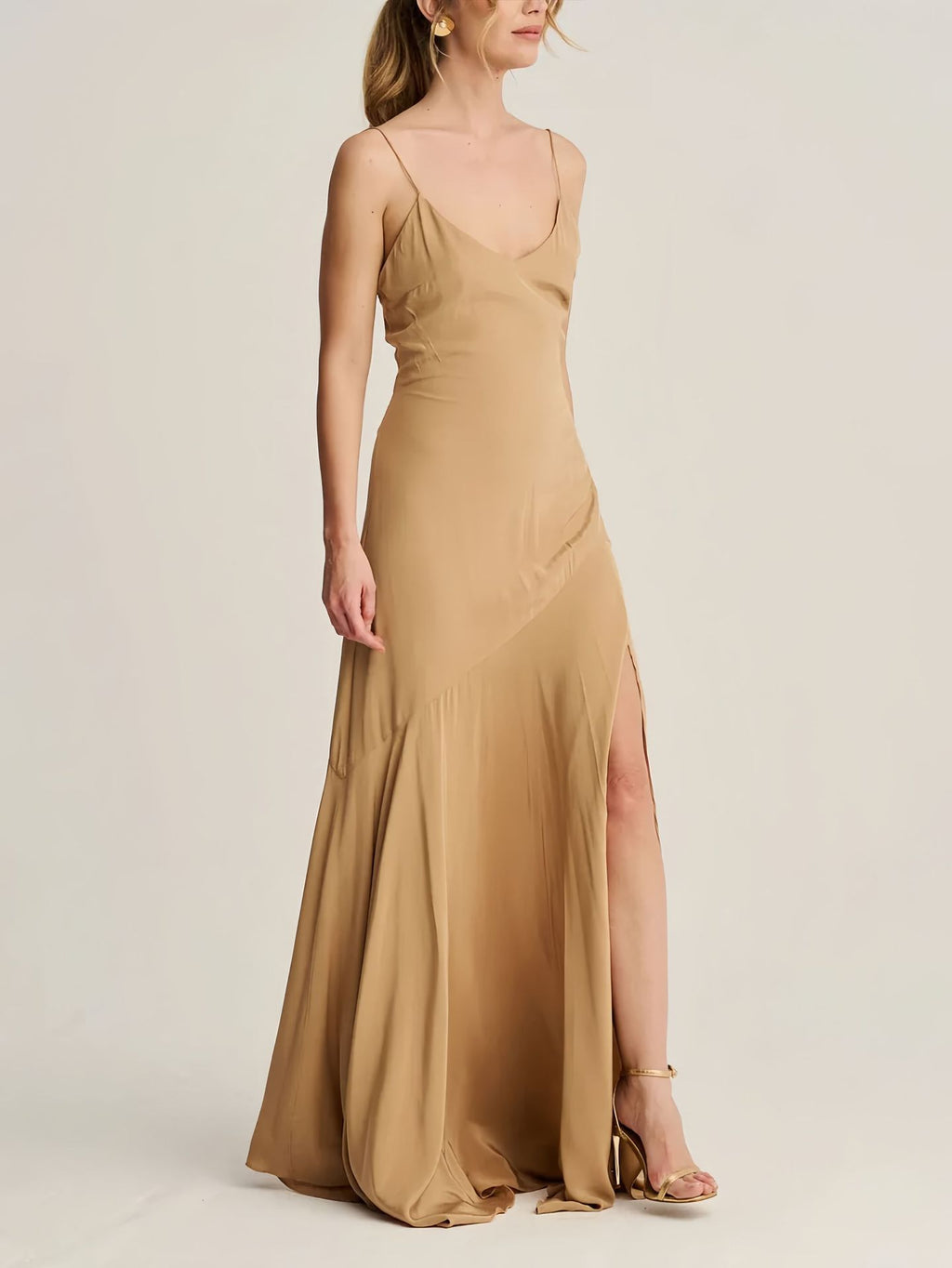 A long skirt with a turtleneck trimmed cape