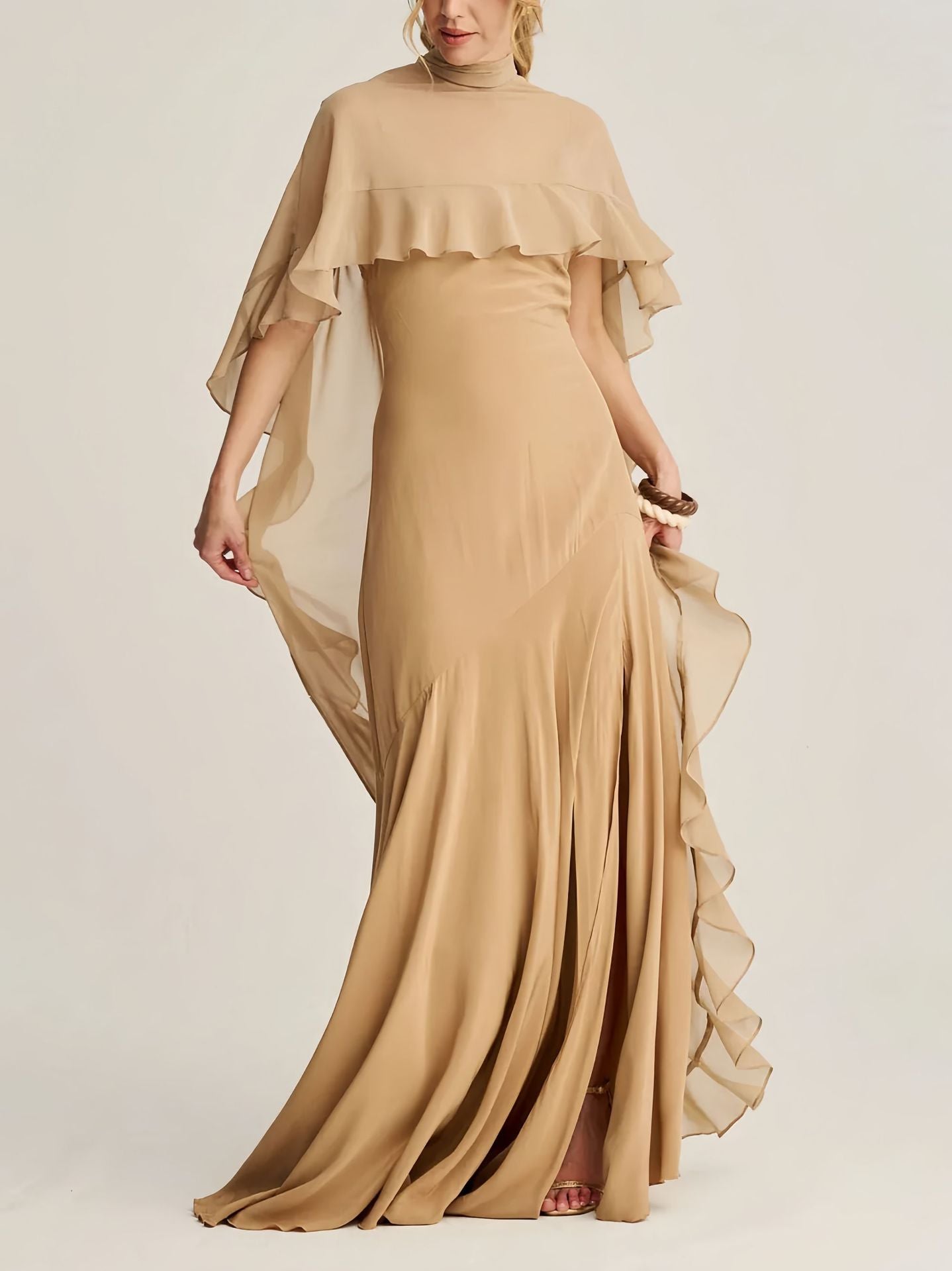 A long skirt with a turtleneck trimmed cape